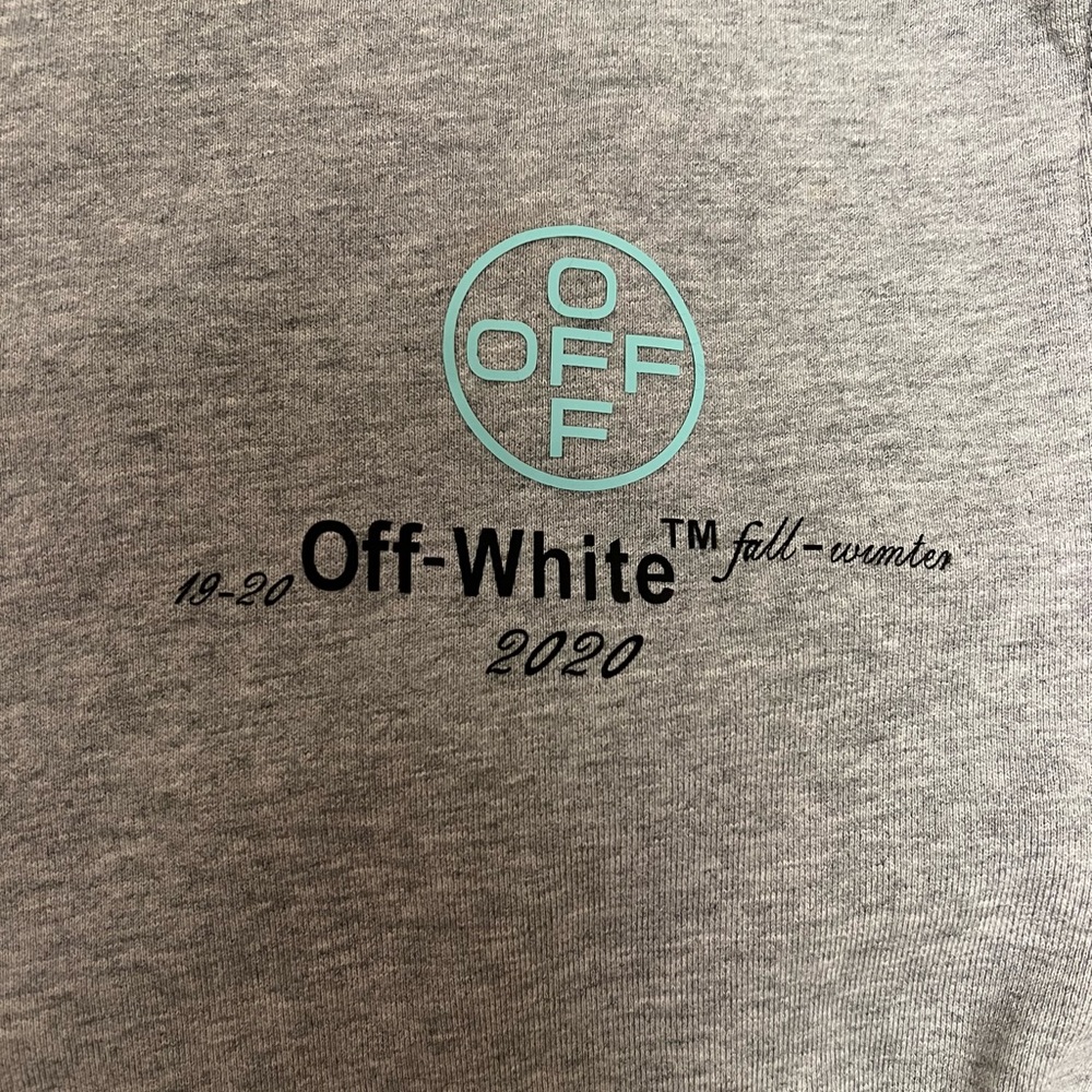 Off-White crewneck sweatshirt fits size large men or medium womens